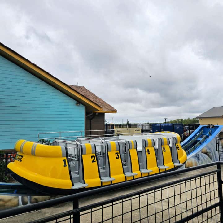 Yellow raft ride on a blue track