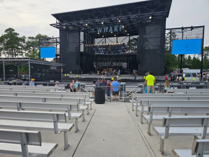 Rows of bleachers and then chairs leading to the Wharf Amphitheater