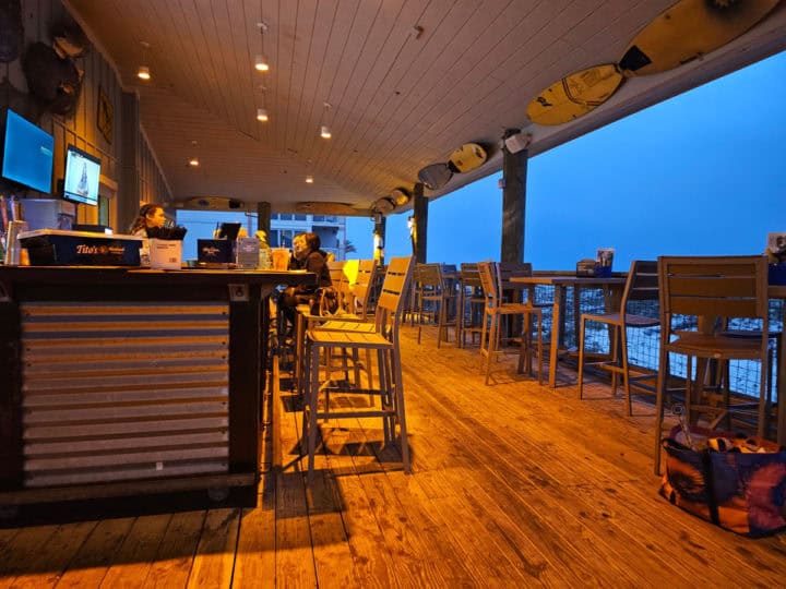 Bar seating under cover with the Gulf of Mexico to one side