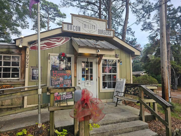 Bill E's bacon sign over the front entrance with steps leading up to the restaurant