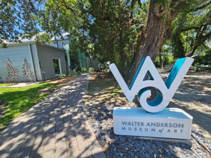 WA Walter Anderson Museum of Art sign next to a tree and building