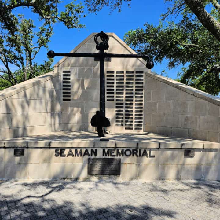 Seaman Memorial with a large anchor and names on plagues 