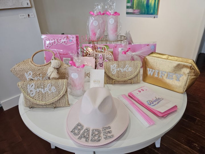 White table covered in bride products at The Wharf Party House Store