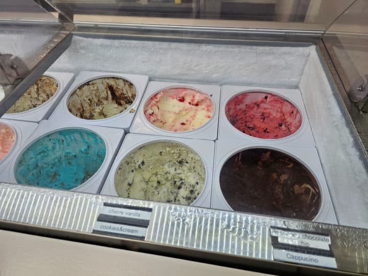 ice cream containers in a freezer at Del's Ice Cream