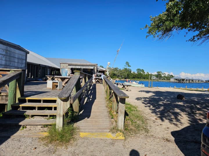 stairs and ramp leading up to a wooden building