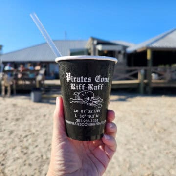 Pirates Cove Riff Raff cup with skeleton head, and phone number