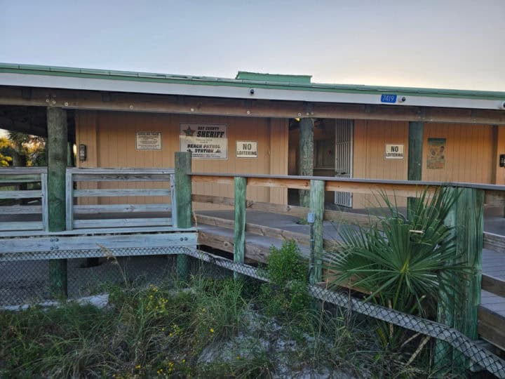 brown buiding with boardwalk entrance leading up to it