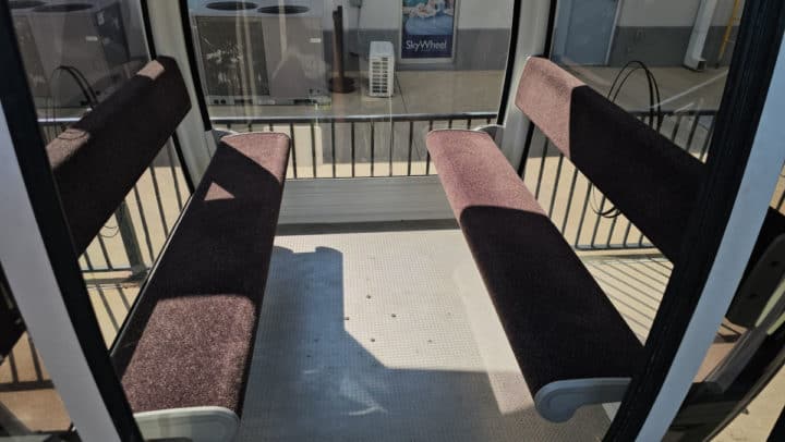 Bench seating inside a SkyWheel gondola