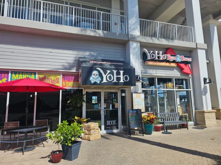 YoHo Rum & Tacos sign over the main glass door entrance