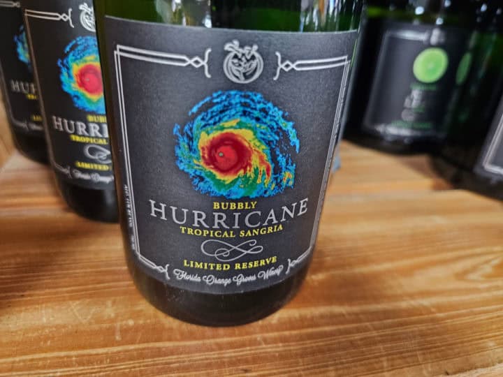 wine bottle with a dark greaty lable for bubbly hurricane sangria