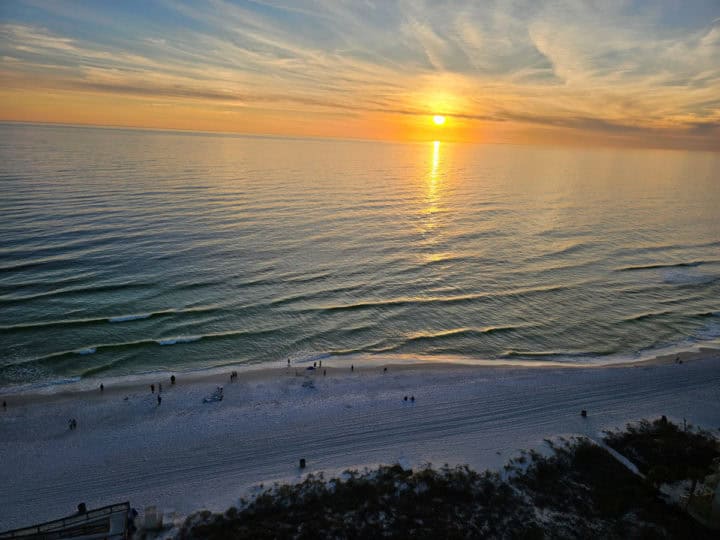 Looking out at Sunset over the Gulf of Mexico and beach 