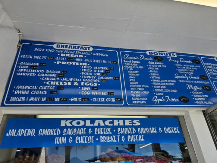 Blue and white Thomas Donuts menu with breakfast, donuts, and kolaches