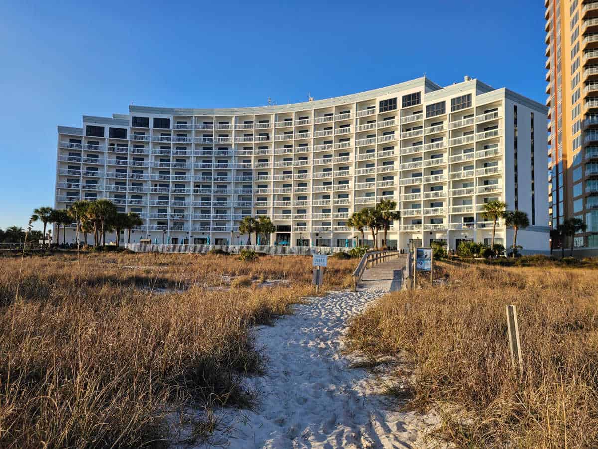Looking up a sand trail to the Island House Hotel