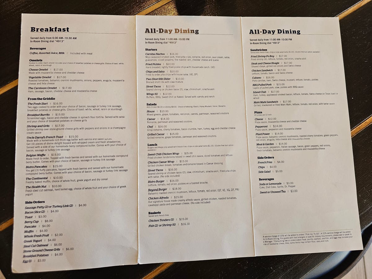 Breakfast, all day dining, menu spread out on a table