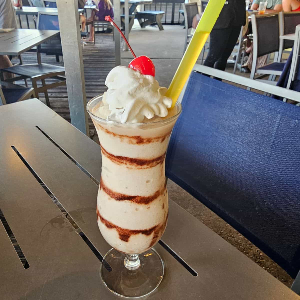 Bushwacker at Shrimp Basket sitting on a table next to a chair