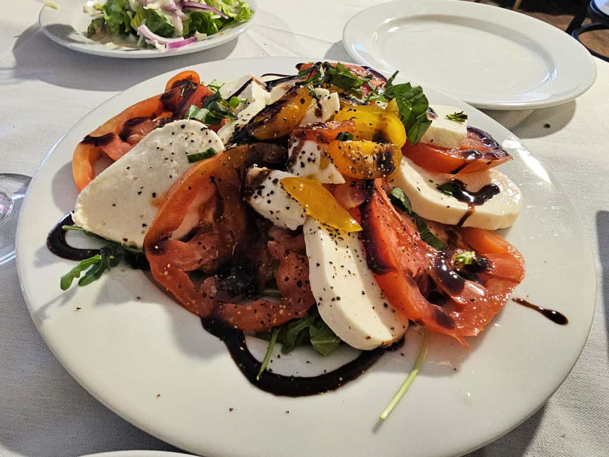 caprese salad on a white plate