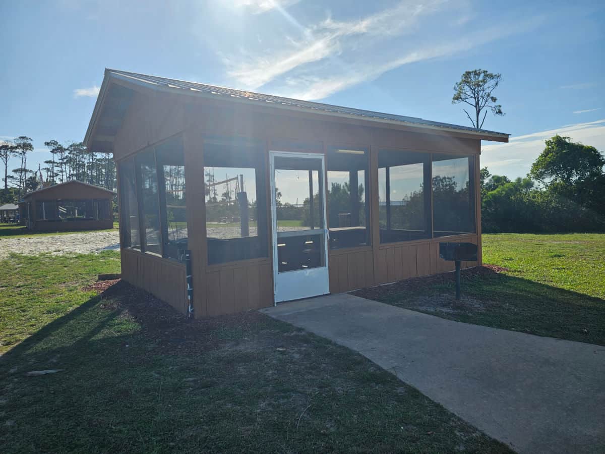 Covered picnic area with white door