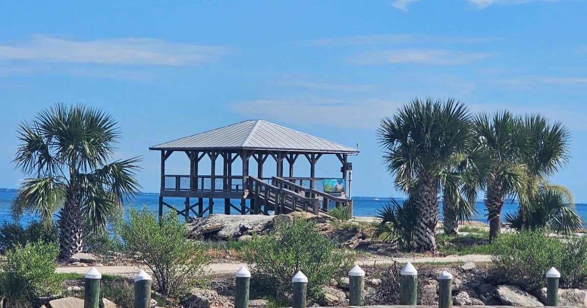 gazebo over the water with palm trees at Frank Pate Park
