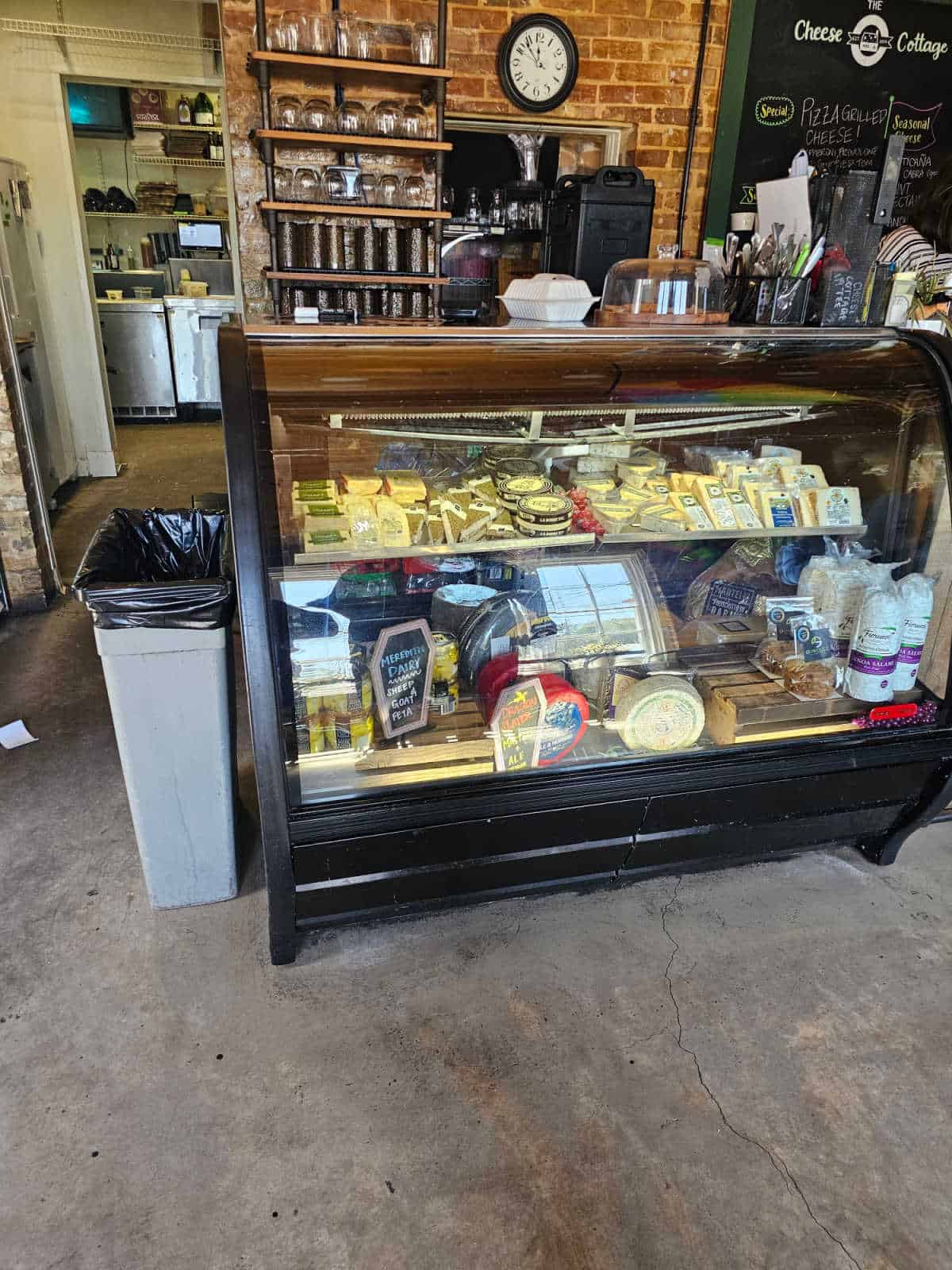The cheese cottage cheese display for sale at counter