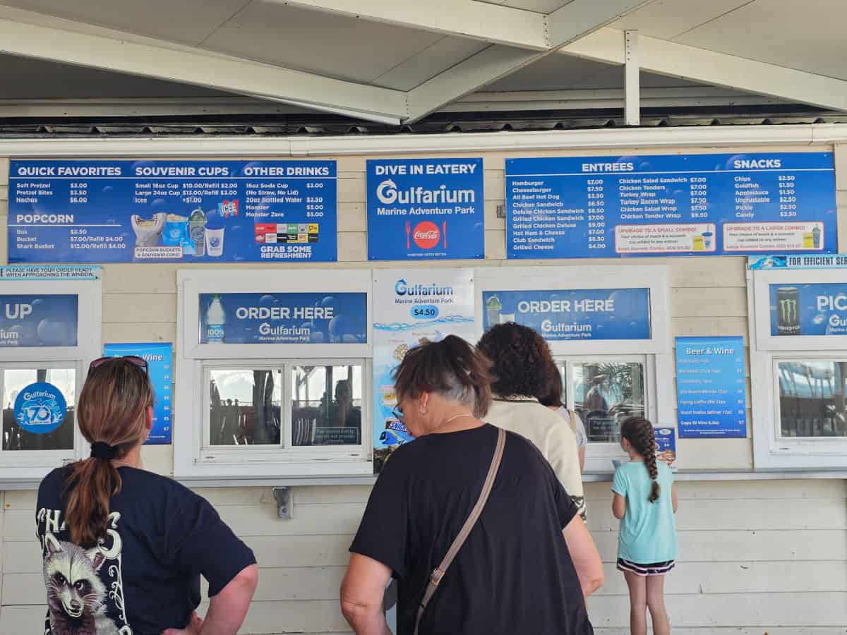 Dive in Eatery menu and order area with people standing in line