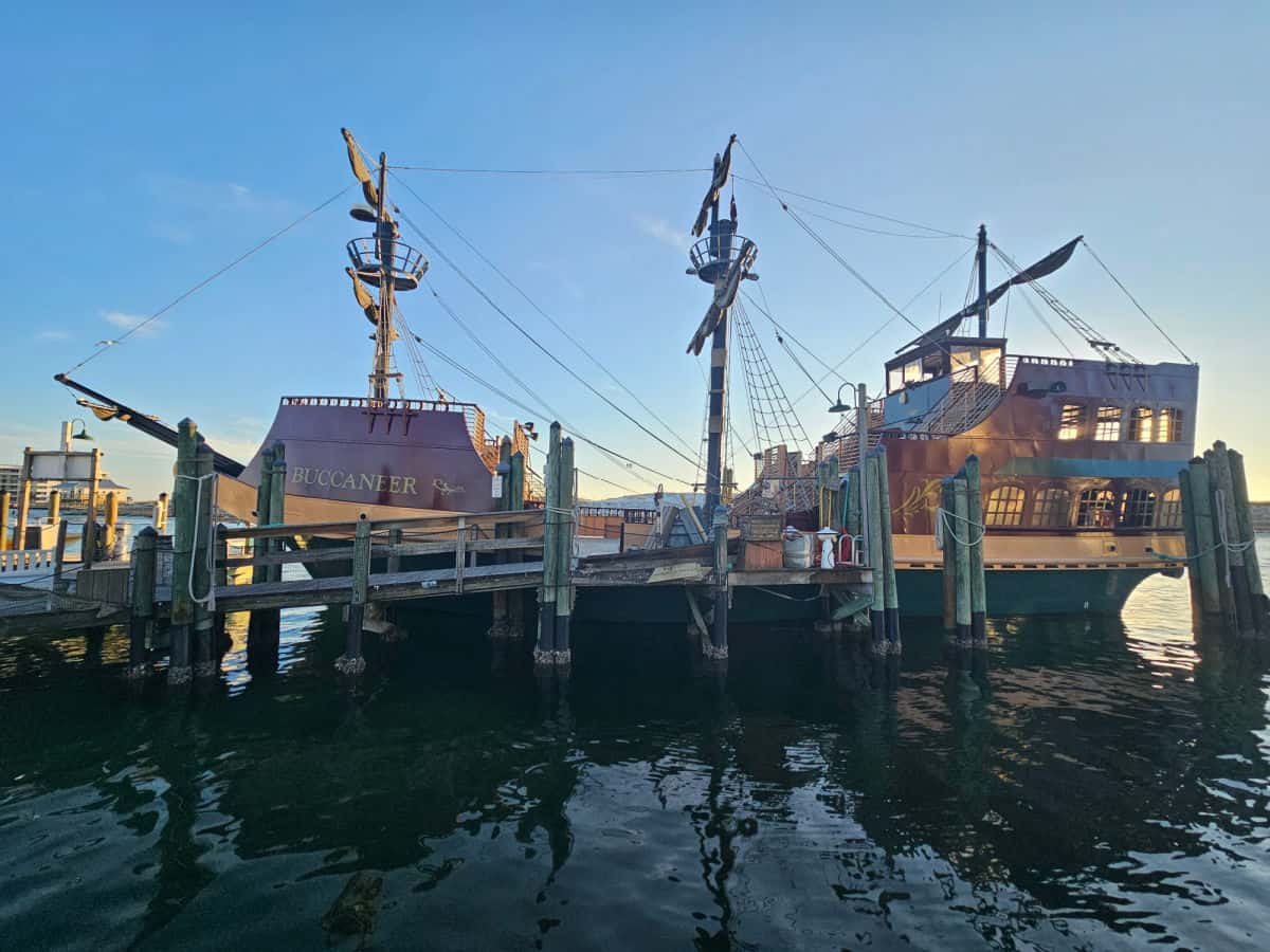 Buccaneer Pirate Ship docked with a wooden ramp leading up to the ship