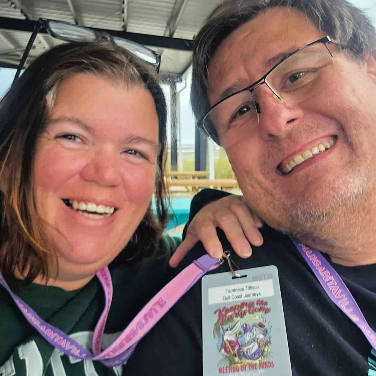 Tammilee and John with a Meeting of the minds badge