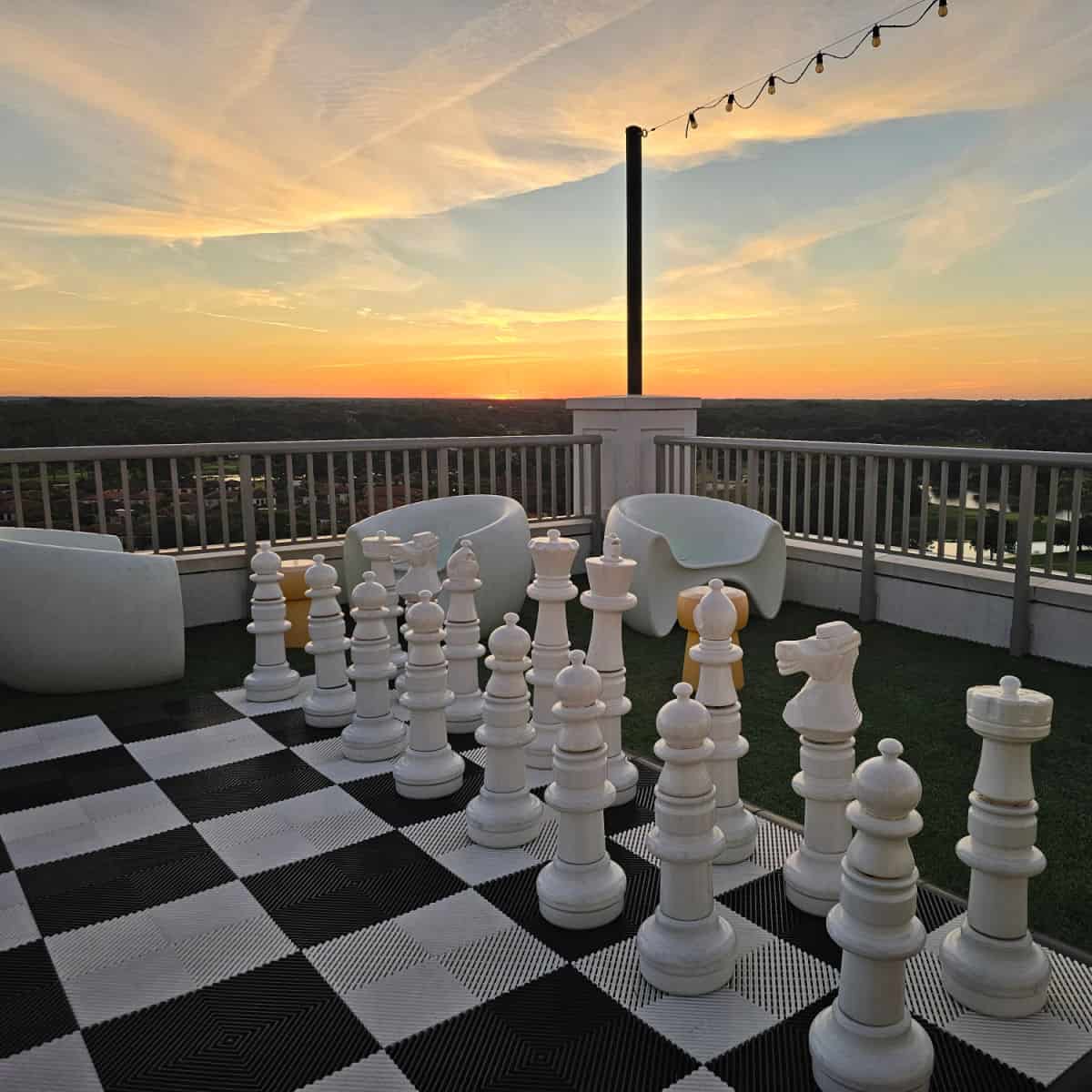 sunrise over the chess set on the rooftop pool deck, hotel effie