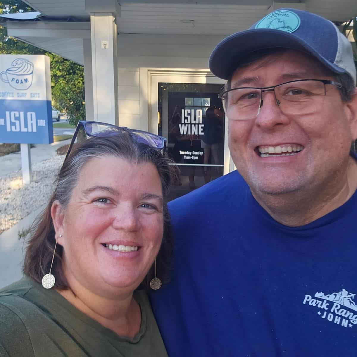 Tammilee and John in front of Isla Wine