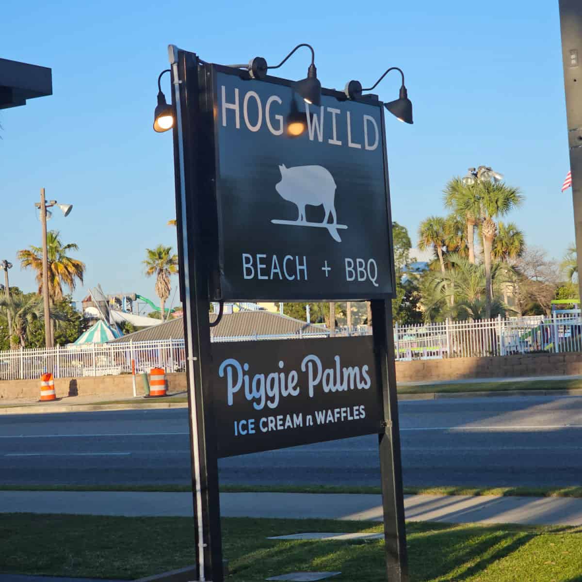 Hog Wild Beach + BBQ Sign with Piggie Palms Ice Cream n Waffles under it