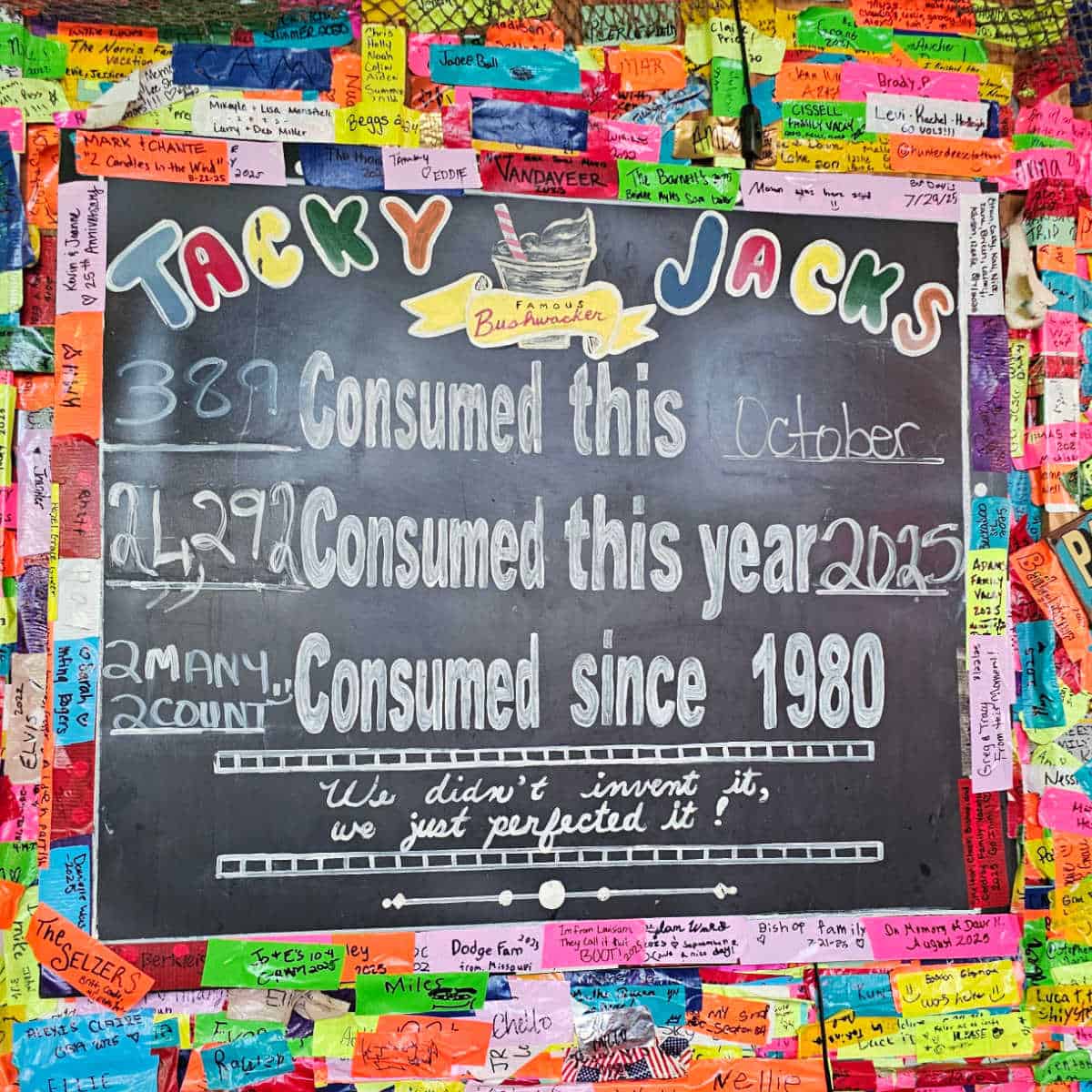 Sign with the number of bushwackers consumed at Tacky Jacks