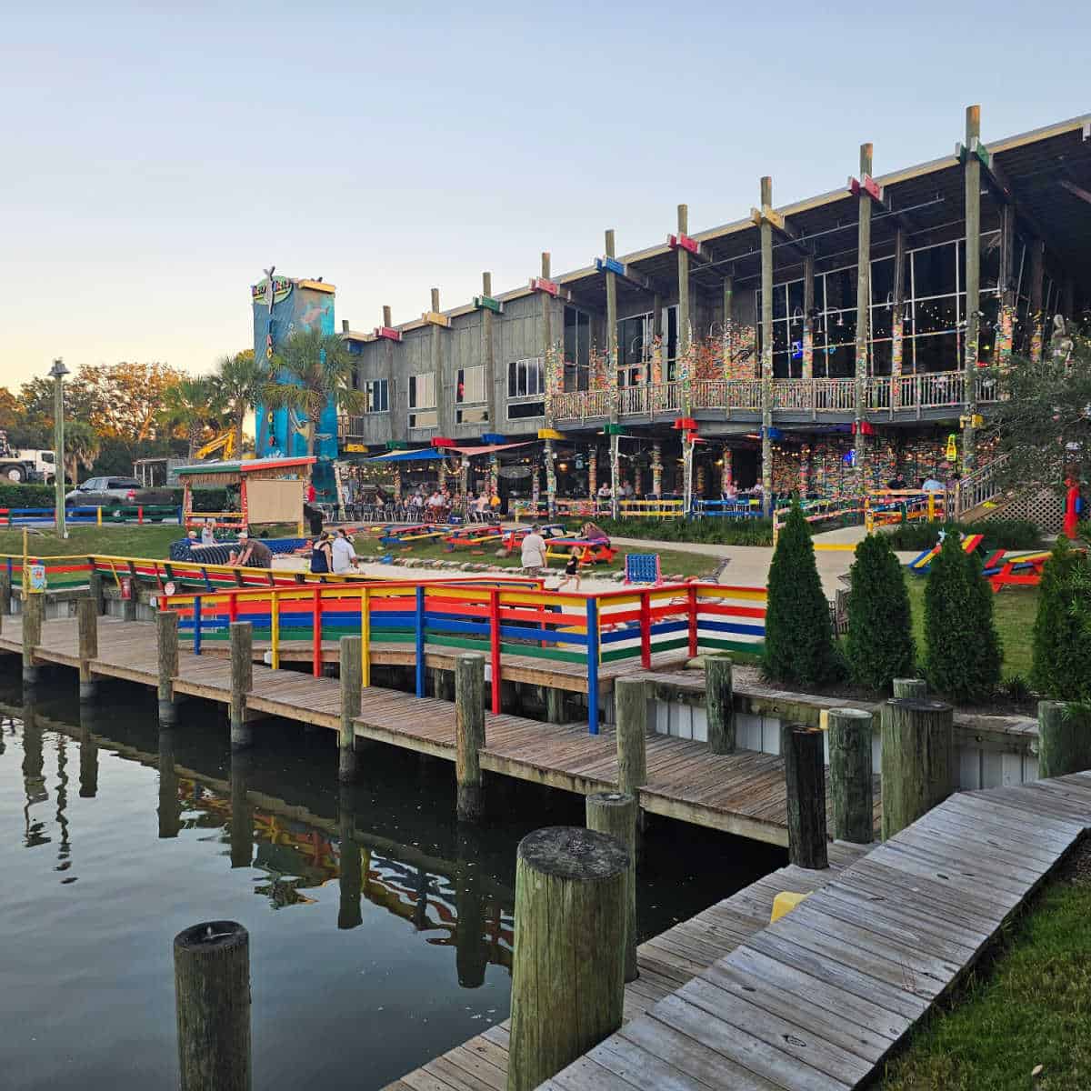 Exterior of Tacky jacks Gulf Shores with colorful tape all over the buildling