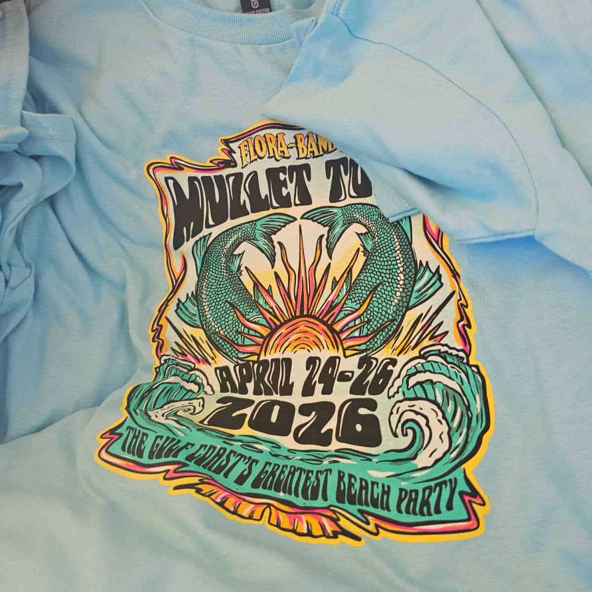 Flora Bama Mullet Toss 2026 T-shirt The gulf Coast's Greatest Beach Party with fish tales and the sun on it