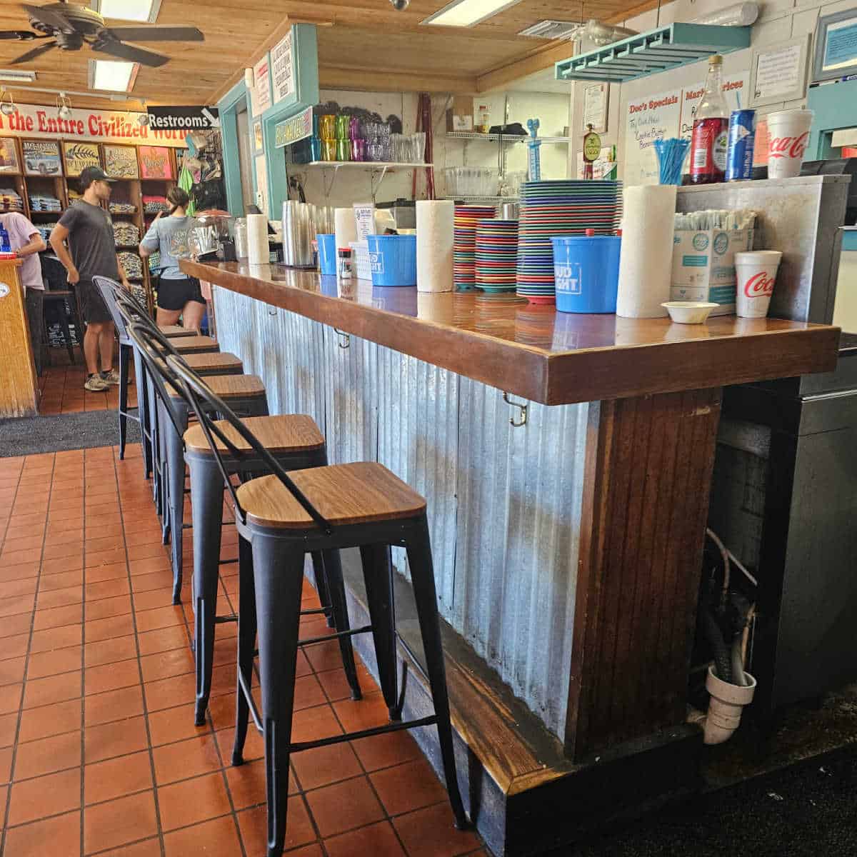 bar seating with tall chairs at Doc's Seafood Shack