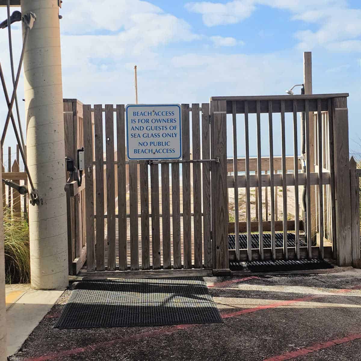 Beach access gate with outdoor shower