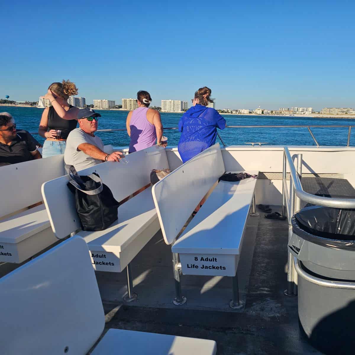 Sea Blaster boat bench seats with people looking out over the water