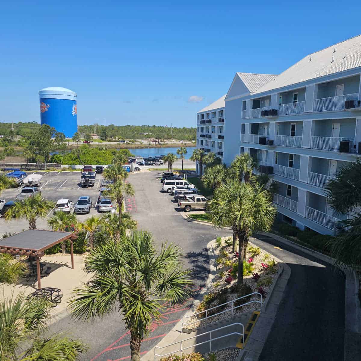 Looking out from the backside of Grand Caribbean to the Orange Beach Water tower and parking area