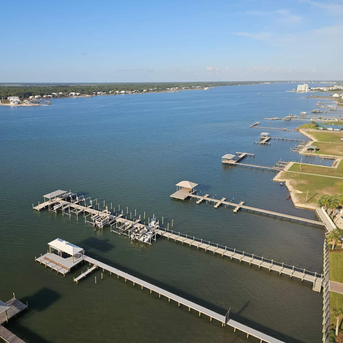 Looking over Little Lagoon with boat piers and buildings along the shoreline from the 15th floor
