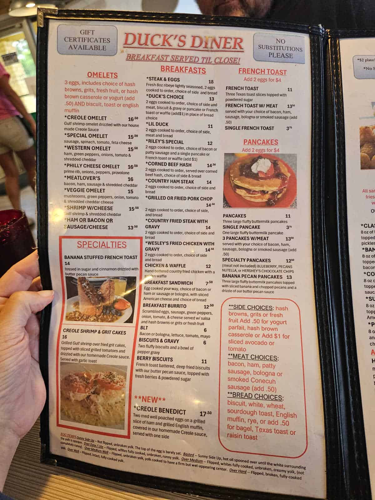 Duck's Diner breakfast menu with omelets, breakfast platters, French toast, side items and more