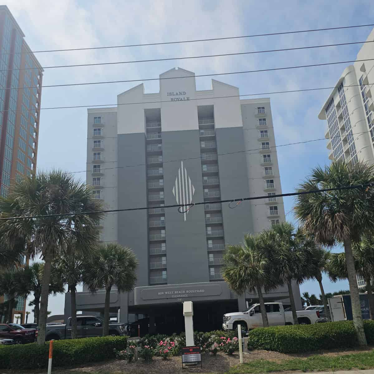 Island Royale exterior with trees in front