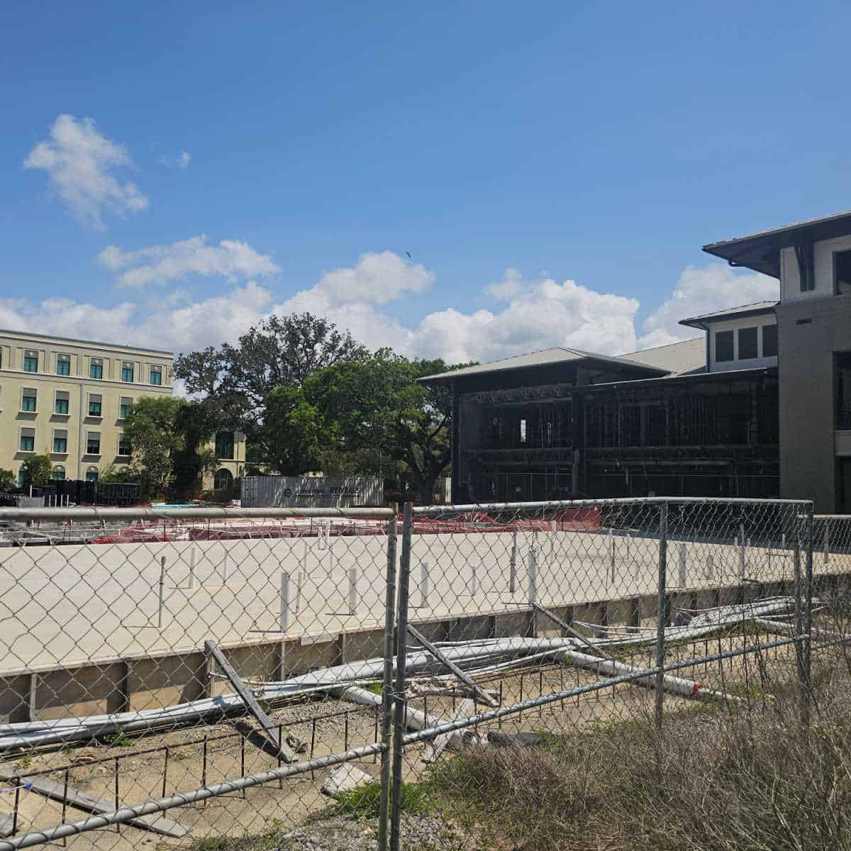 concrete slab with pipes coming out of it for the Hotel Rain construction