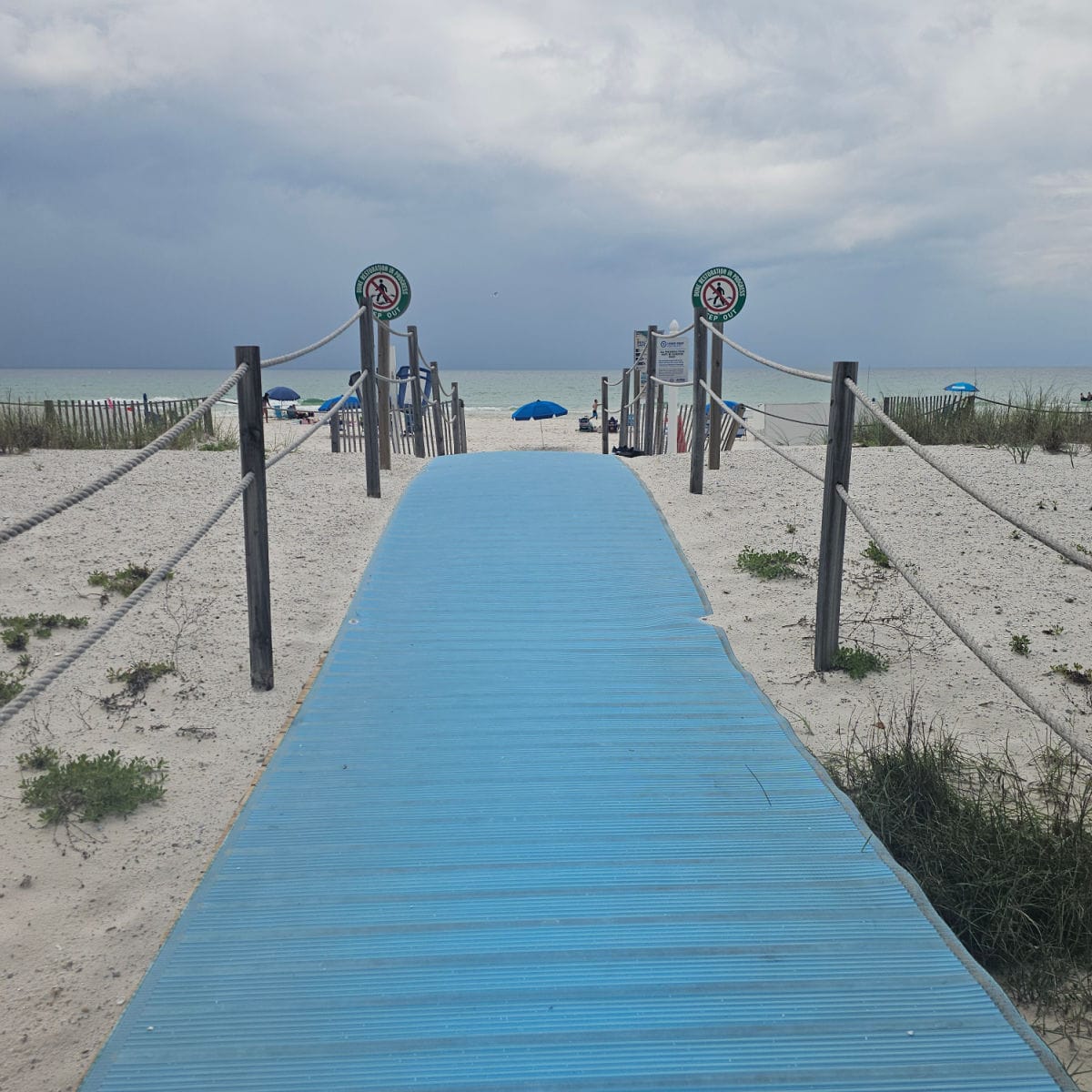 accessibility path to the beach with Gulf waters in the background