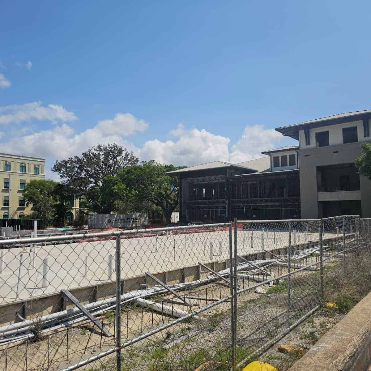 Concrete slab next to the construction for the hotel Rain