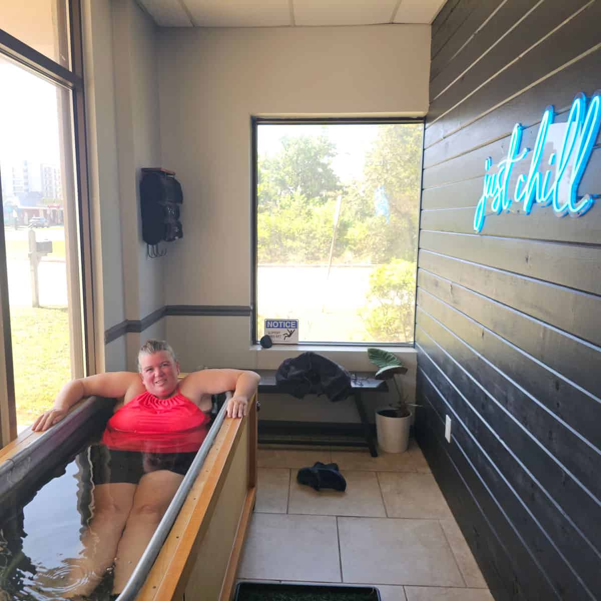 Just chill neon sign on a dark wall, tammilee in a cold plunge pool