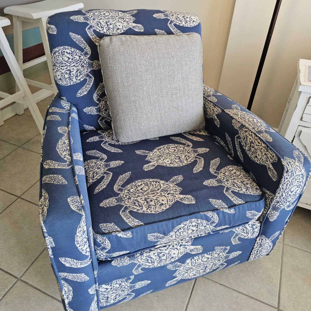 blue chairwith turtles printed on it