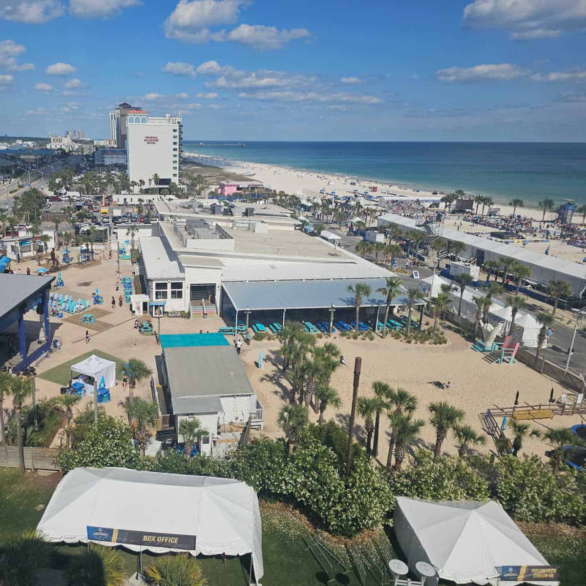 Looking out over The Hangout restaurant open area and the beach with the Gulf in the background