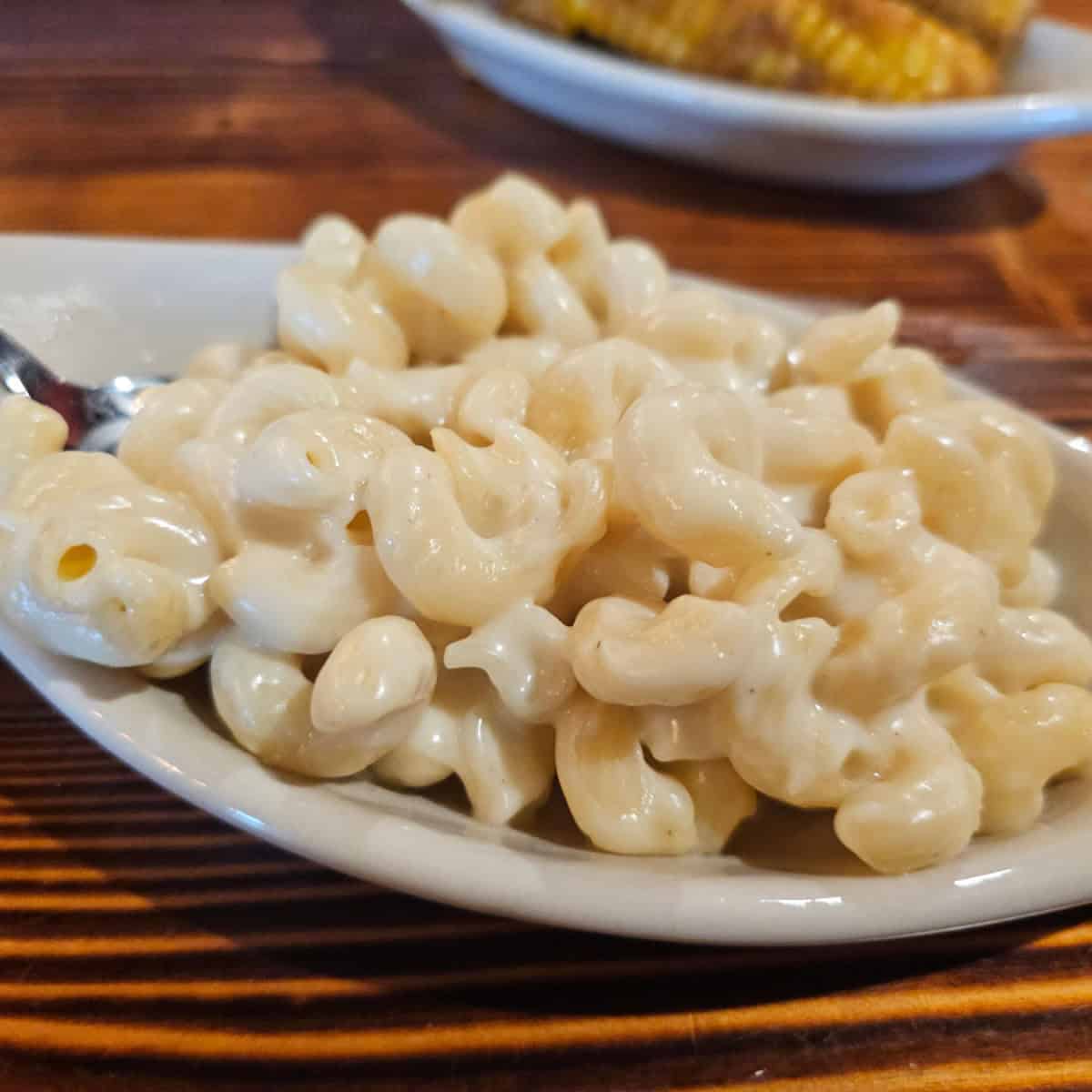 White cheddar mac and cheese on a white plate