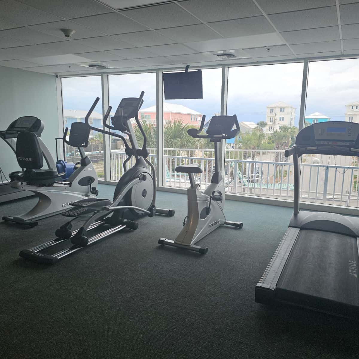 fitness center looking out over a parking area.