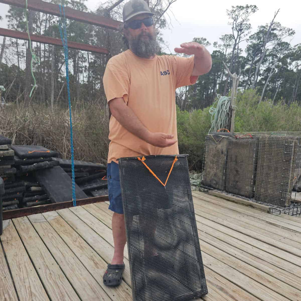 man with an empty oyster cage