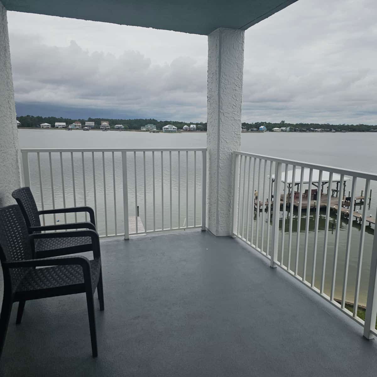 Balcony with two chairs overlooking Little Lagoon