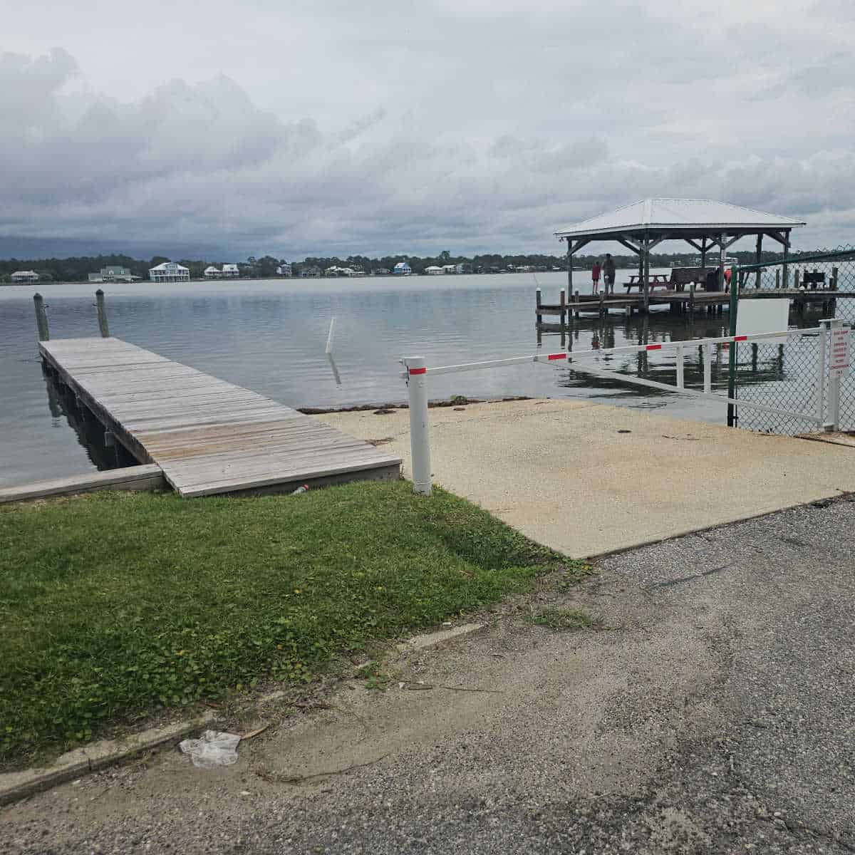 gates boat ramp next to a wooden pier onto Little Lagoon